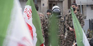 Iran president vows defiance as protests build against regime amid US military build up